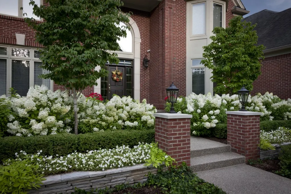 Affordable lawn care service for homes across Troy, MI - Twin Pines Landscaping