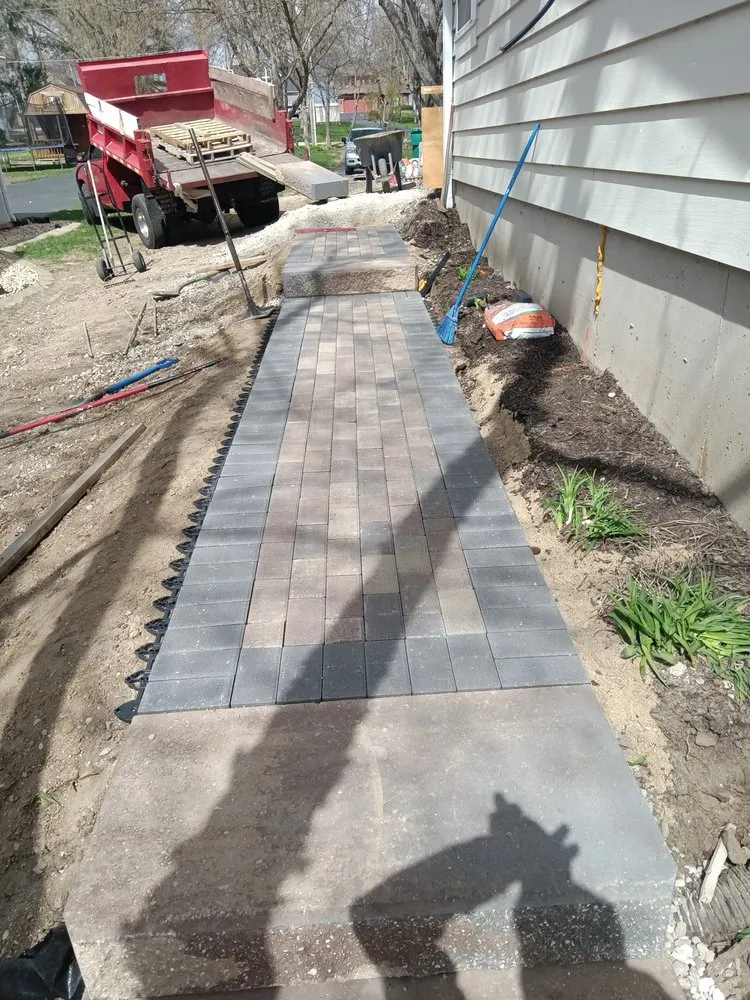 Affordable yard maintenance for year-round maintenance in Sheridan, IL by Twins Landscaping & Brick Paving