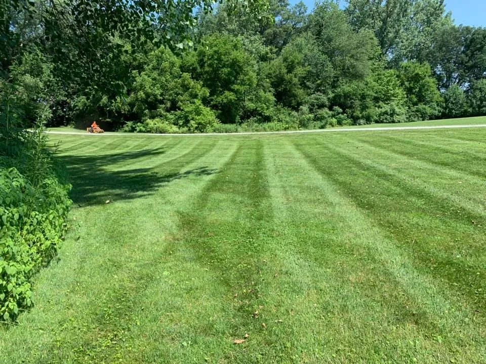 Affordable landscape design for homes in Rochester, IN by Two and a Half Men Lawn Care