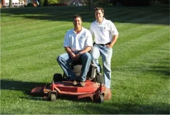 Two Boys and a Lawn Mower Logo