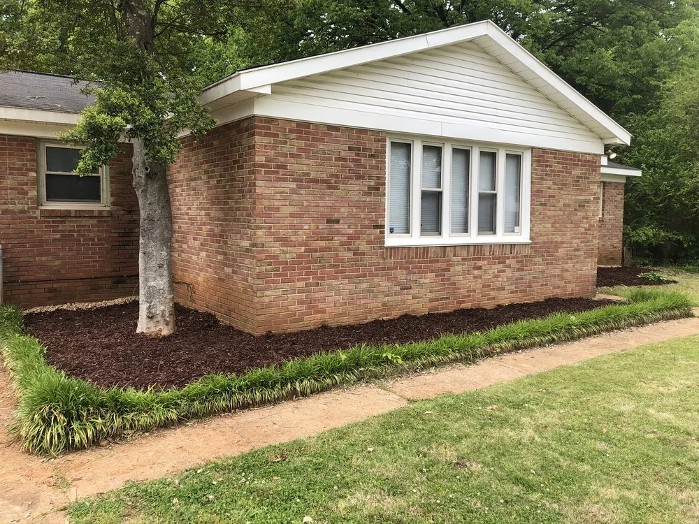 Professional landscape installation in Covington, LA by Two Broke Brothers