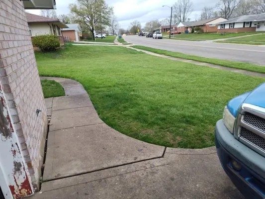 Two Broke Men And A Lawnmower Logo