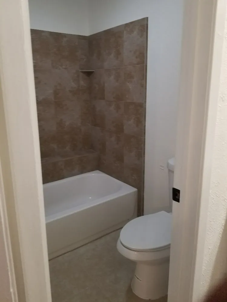 Affordable outdoor landscaping for residential properties in Irving, TX by Two Brothers at work