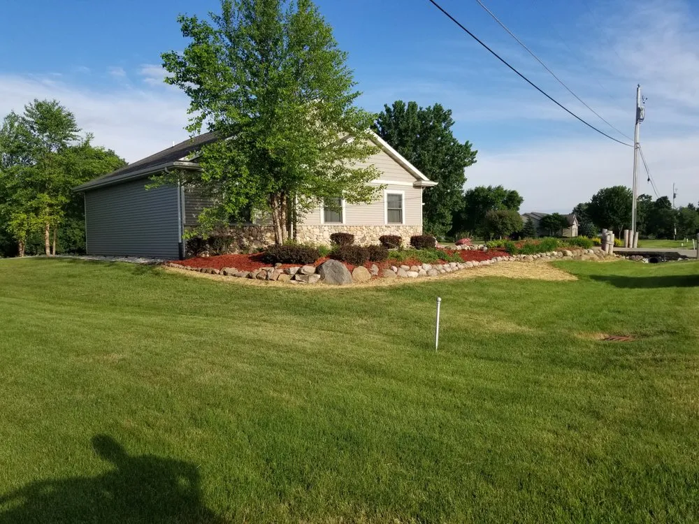 Professional lawn mowing service for outdoor upgrades in Menasha, WI by Two Brothers Landscaping