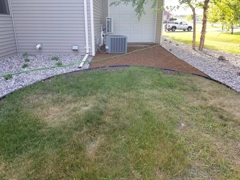 Custom garden landscaping in Menasha, WI by Two Brothers Landscaping