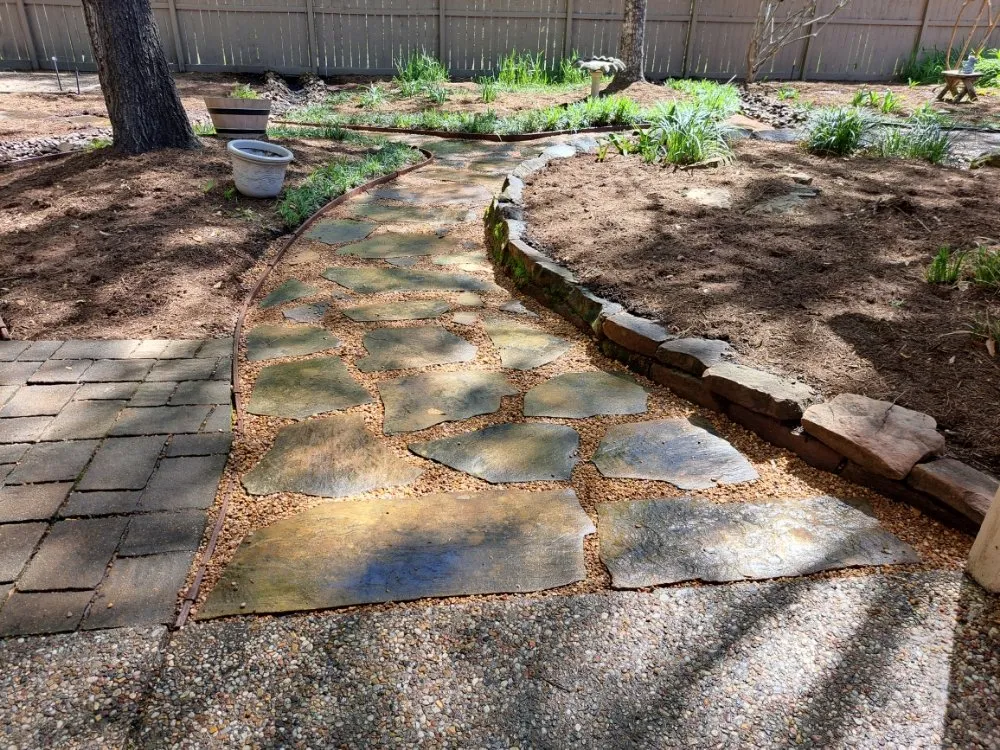 Custom landscape installation in Shenandoah, TX by Two brothers landscaping