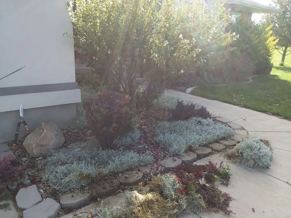 Custom landscape installation for outdoor upgrades in Hyrum, UT by Two Brothers Lawn Care Services