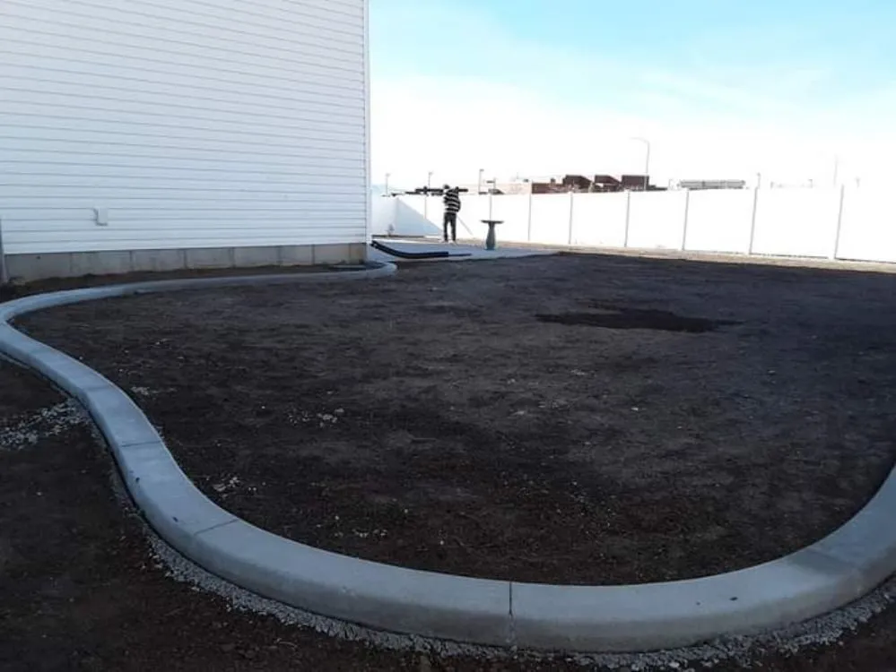 Reliable lawn mowing service with custom design in Hyrum, UT by Two Brothers Lawn Care Services