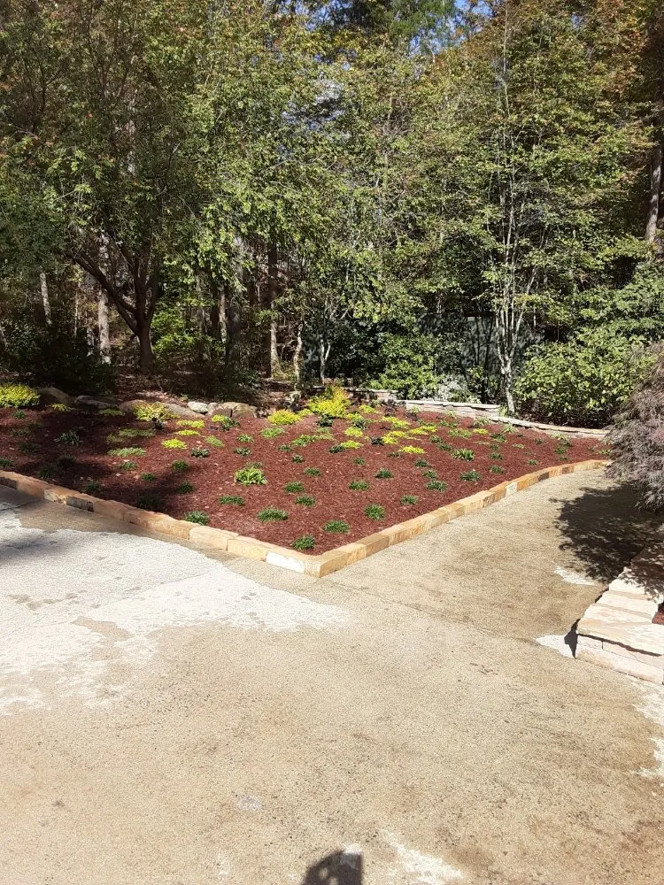 Affordable lawn mowing service for year-round maintenance across Burlington, NC - Two Brothers Masons and Landscaping