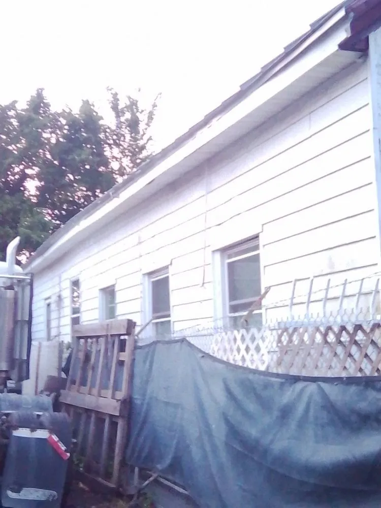 Affordable yard maintenance in Portsmouth, VA - Two brothers painting and Pressure Washing