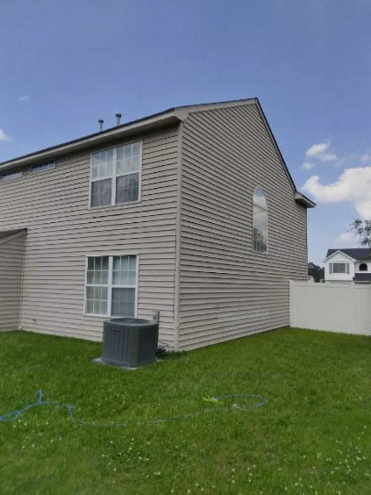 Affordable residential landscaping for beautiful yards across Portsmouth, VA - Two brothers painting and Pressure Washing