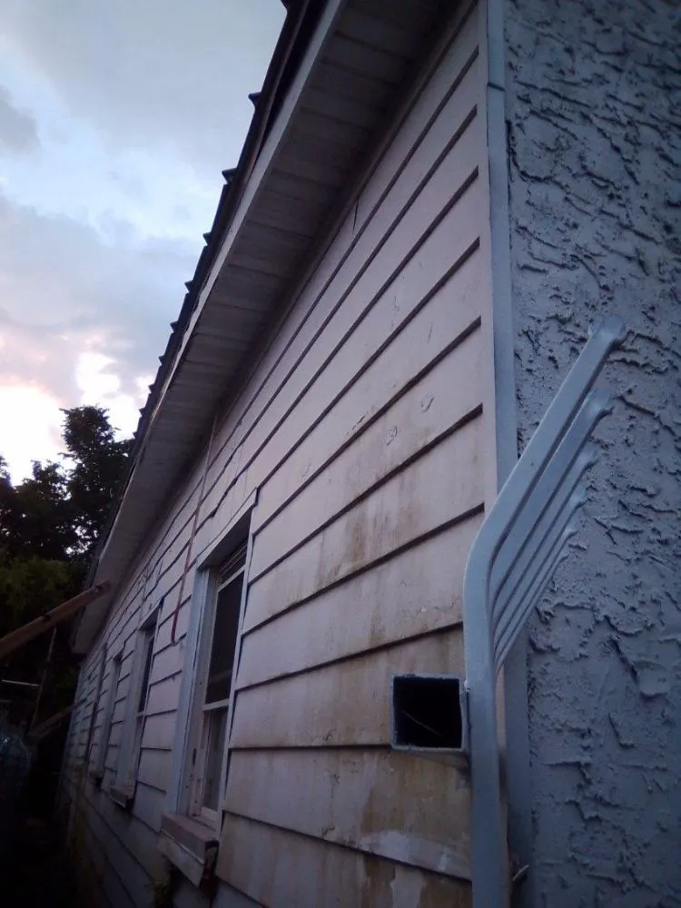 Reliable yard maintenance in Portsmouth, VA - Two brothers painting and Pressure Washing