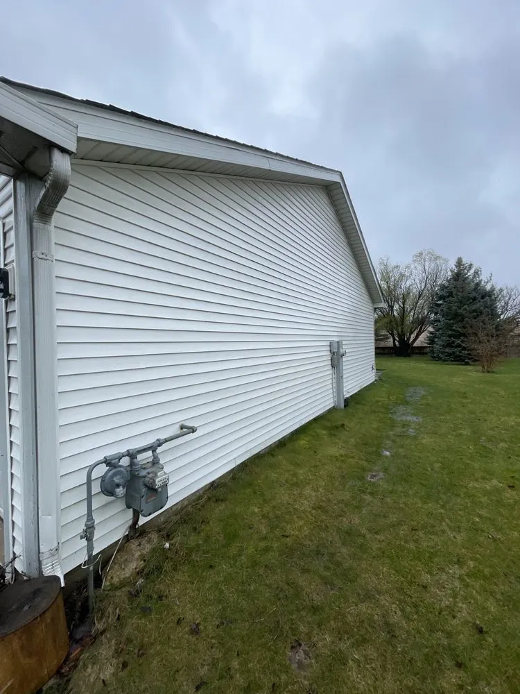 Custom lawn mowing service for homes in Warrenville, IL by Two Burdes Lawn Care