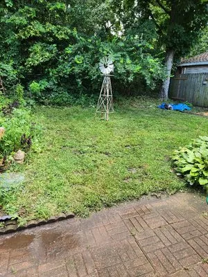 Two Dudes & A Mower Logo