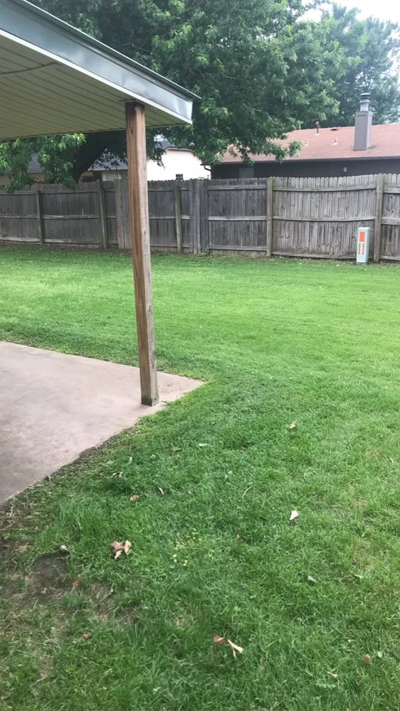 Custom landscape installation for outdoor upgrades in Mounds, OK by Two Feathers lawn and outdoors
