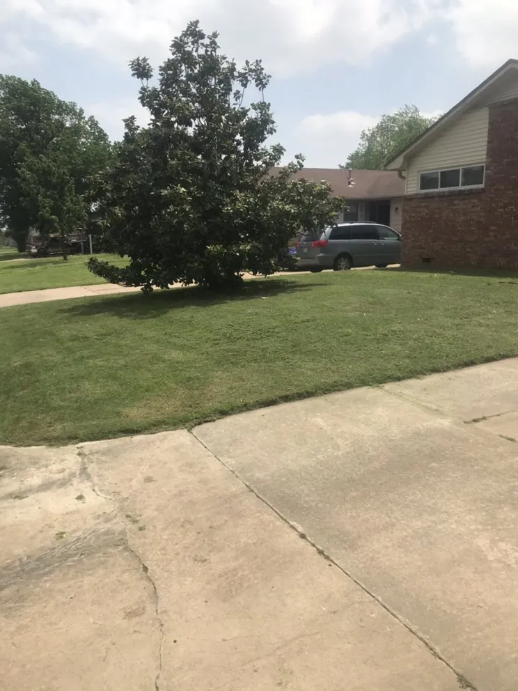 Custom landscape design in Mounds, OK by Two Feathers lawn and outdoors