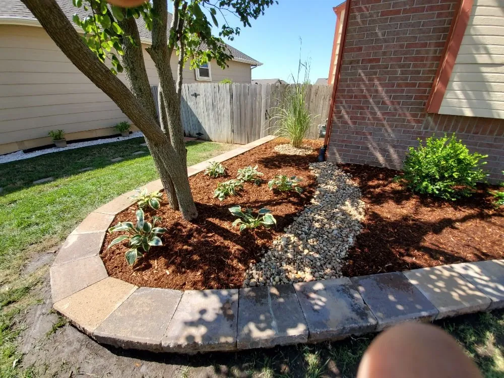 Top-rated lawn care service with custom design in Derby, KS by Two Lawn Rangers