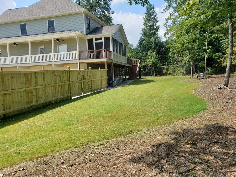 Affordable yard maintenance for homes in Adairsville, GA by Two men and a mower