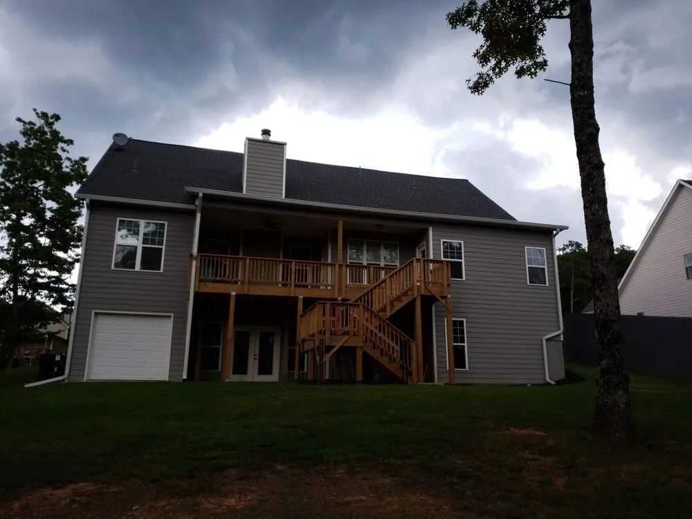 Expert yard maintenance in Adairsville, GA by Two men and a mower