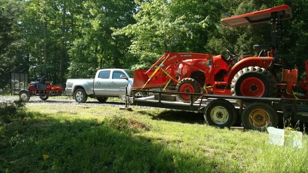 Two Men And A Tractor
