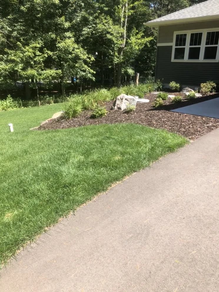 Custom landscape installation for homes across Eau Claire, WI - Two Rivers Lawn & Landscape