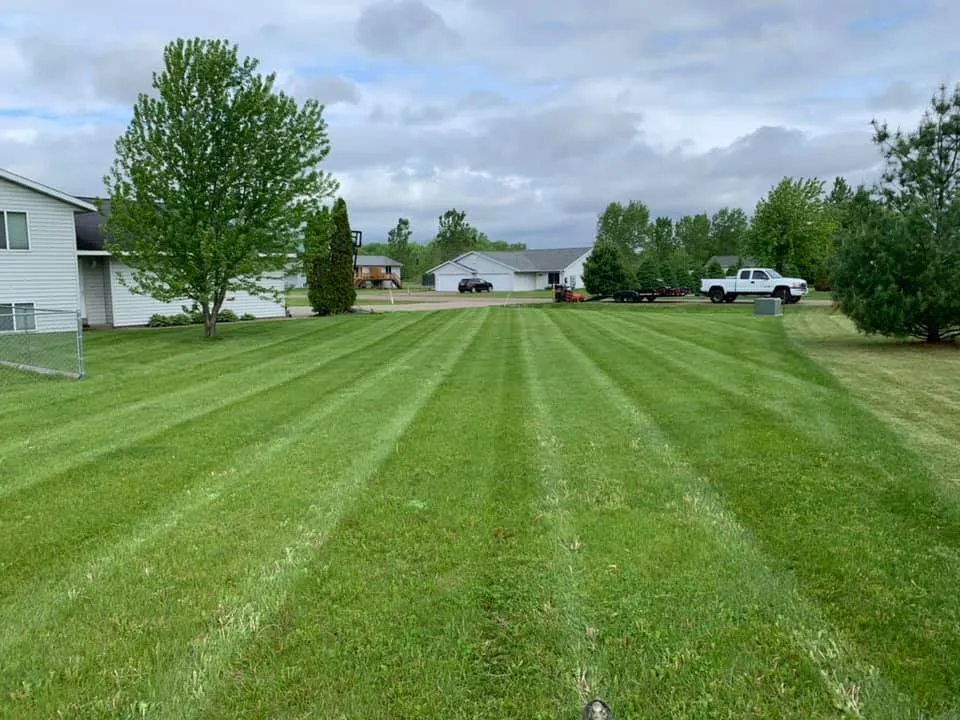 Trusted lawn mowing service with custom design across Eau Claire, WI - Two Rivers Lawn & Landscape