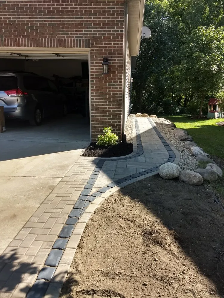 Top-rated lawn mowing service in South Lyon, MI by Two Shovels & a Wheelbarrow