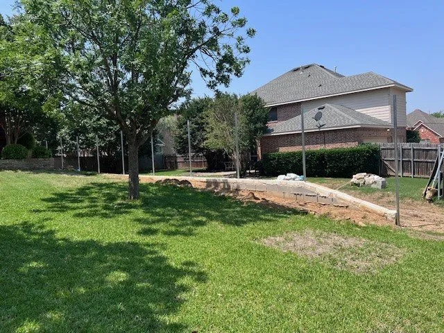 Professional garden landscaping for year-round maintenance across Red Oak, TX - TX Blue Line Construction