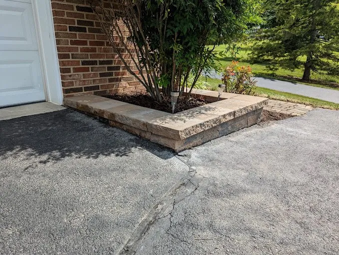 Custom landscape installation for residential properties in Eldersburg, MD by Tycoon Solutions Landscaping