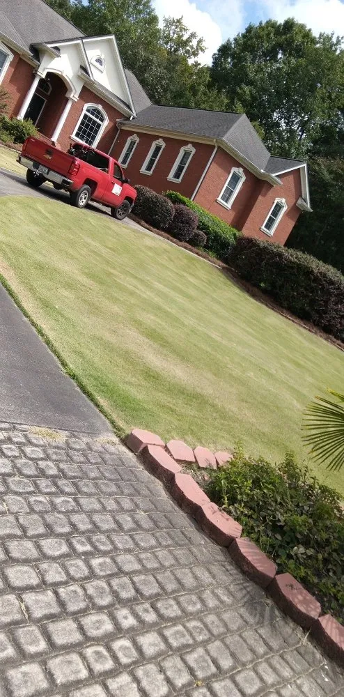 Trusted lawn mowing service near you in Newnan, GA by Tyler & Taylor landscaping