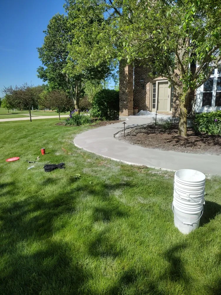 Professional landscape installation with custom design in Janesville, WI by Ty's Landscaping