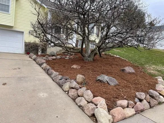 Local garden landscaping with custom design in Fairfax, IA by Ty's Snow Removal and Landscaping
