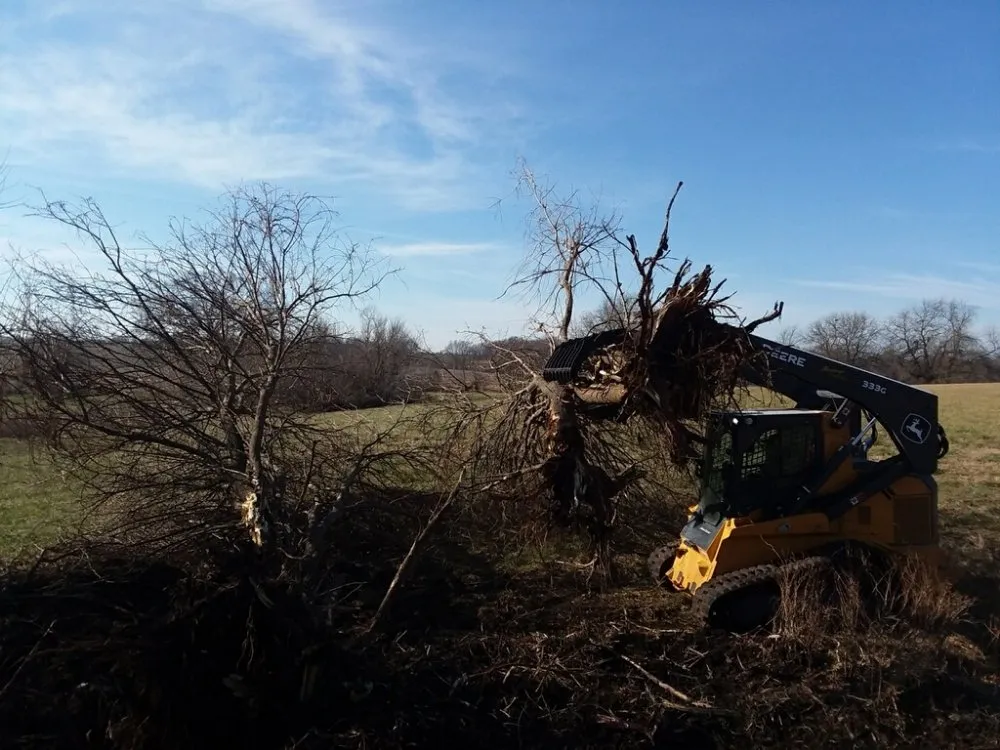 Expert lawn care service experts serving Richmond, MO - Ultimate Land Solutions