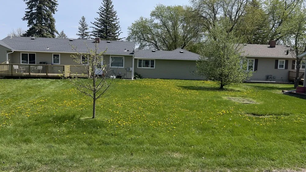 Trusted lawn mowing service for beautiful yards in Thief River Falls, MN by Ultimate Landscapes 701