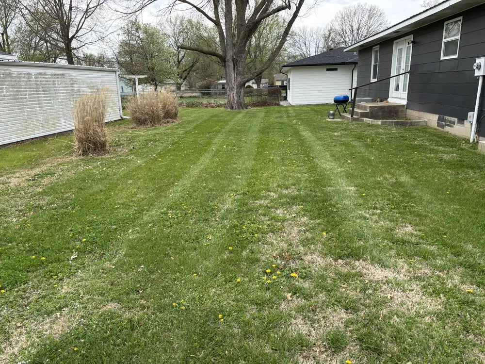 Custom lawn care service for residential properties in Greenfield, MO by Ultimate Lawn & Home