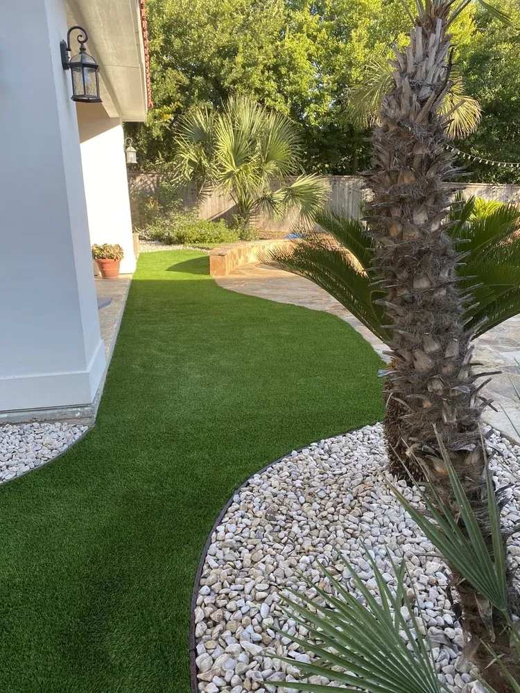 Professional lawn mowing service for residential properties in San Antonio, TX by Ultimate Turf Solutions