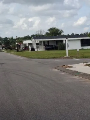 Uncle Duffy's Lawn Care Logo