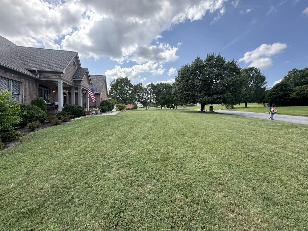 Custom landscape installation with custom design in Friendsville, TN by Uncle Jimmy’s Lawn Care