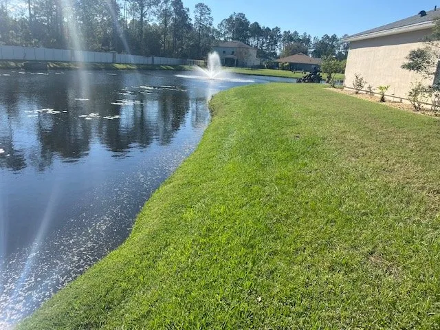 Trusted lawn care service with custom design in Daytona Beach, FL by Undeniable Cuts Lawn & Landscaping