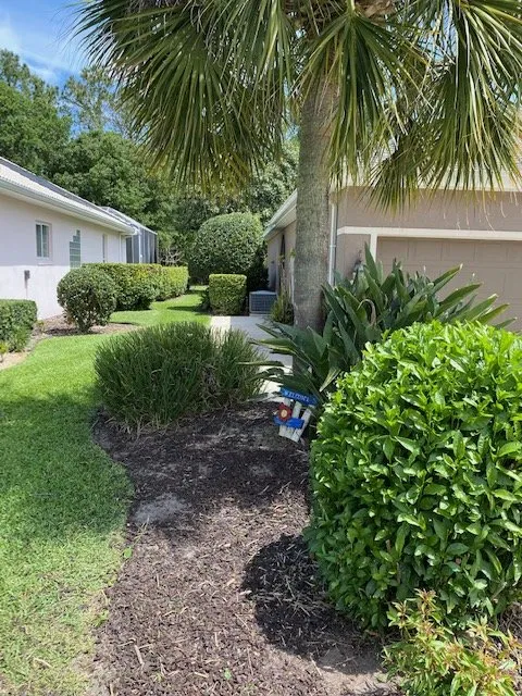 Professional yard cleanup service with custom design across Daytona Beach, FL - Undeniable Cuts Lawn & Landscaping