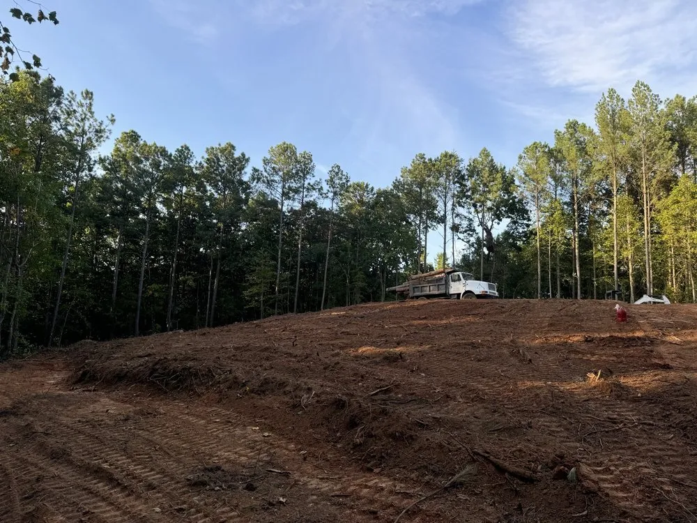 Affordable lawn care service for year-round maintenance in Talking Rock, GA by Under Grace Transport And Grading
