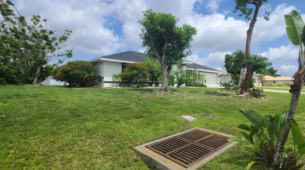 Affordable residential landscaping with custom design in La Belle, FL by Under The Oaks Lawn Service