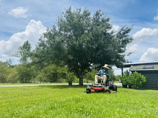 Under The Oaks Lawn Service