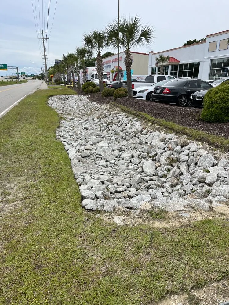 Trusted lawn mowing service for residential properties in Conway, SC by Under The Sun Landscaping