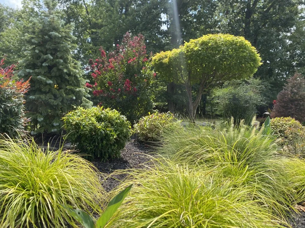 Local lawn care service for year-round maintenance in Dresher, PA by Unique Designers and Landscapers