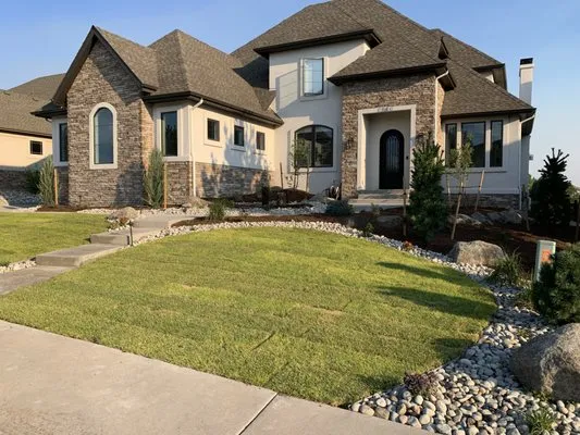 Unique Landscapes and Gardens Logo