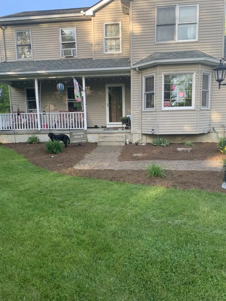 Custom landscaping services for residential properties in Stafford, CT by Unique Landscapes By Forrest Rose