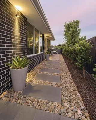 Unique Quality Lawn Care & Landscaping Logo