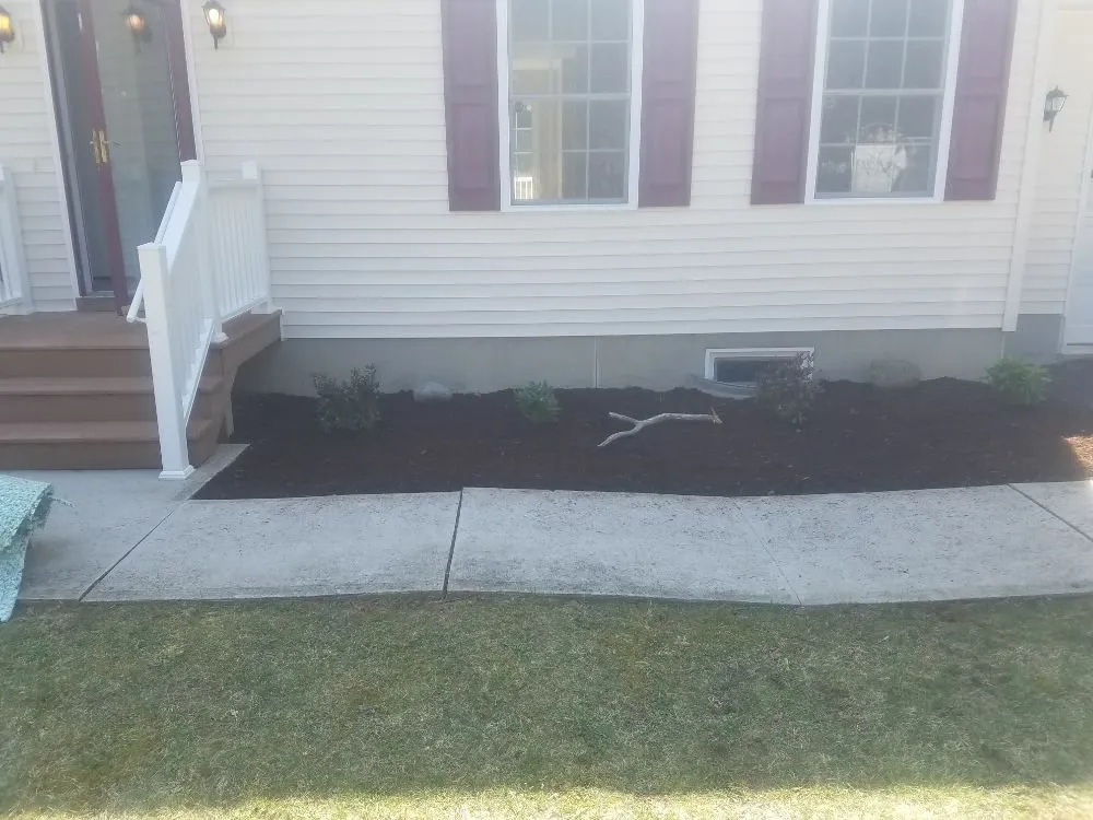 Custom landscape installation with custom design in Branchville, NJ by Unique Services