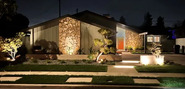 Unique Vision Landscaping Logo